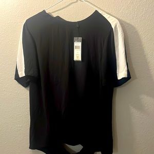 I’m selling a cute black BCBG blouse! Never used!